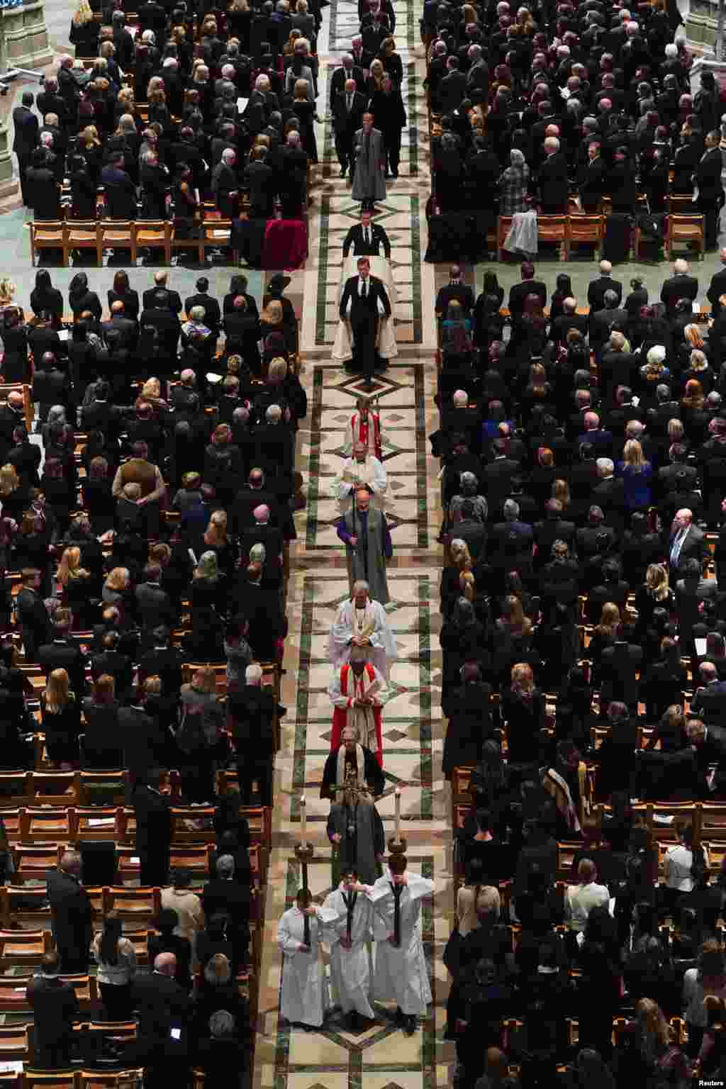The casket of retired U.S. Supreme Court Justice Sandra Day O’Connor is carried, during the funeral service at the Washington National Cathedral in Washington.