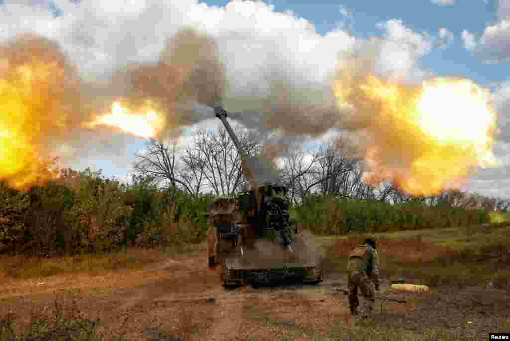 A Ukrainian serviceman fires a 2S22 Bohdana self-propelled howitzer towards Russian troops at a position in Donetsk region, Ukraine, Sept. 13, 2023.