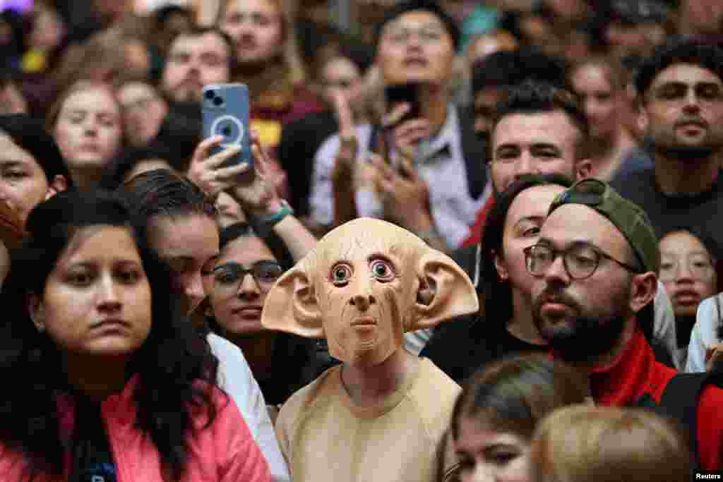 A Harry Potter fan, dressed as Dobby, attends Back to Hogwarts Day at Kings Cross Station in London, Britain.