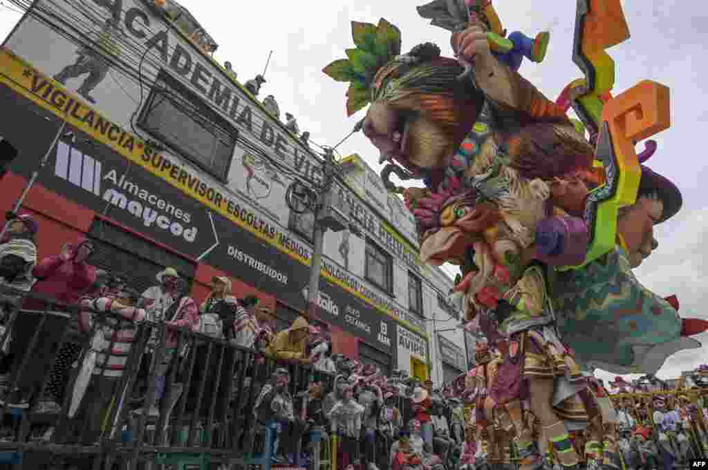 A participant dances during the "White Day" parade during the Carnival of Blacks and Whites in Pasto, Colombia, Jan. 6, 2024.