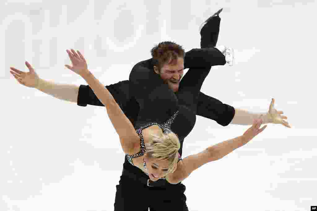 Britain's Lydia Smart and Harry Mattick perform in the pairs short program during the ISU European Figure Skating Championships in Kaunas, Lithuania.