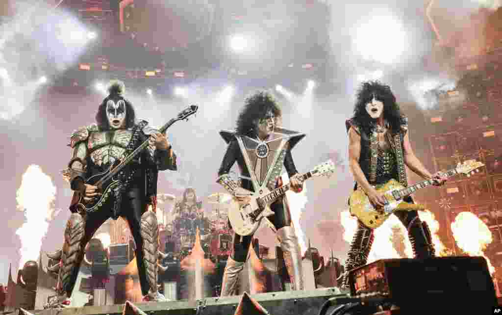 Gene Simmons, left, Tommy Thayer and Paul Stanley of KISS perform during the final night of the "Kiss Farewell Tour," Dec. 2, 2023, at Madison Square Garden in New York. (Photo by Evan Agostini/Invision)