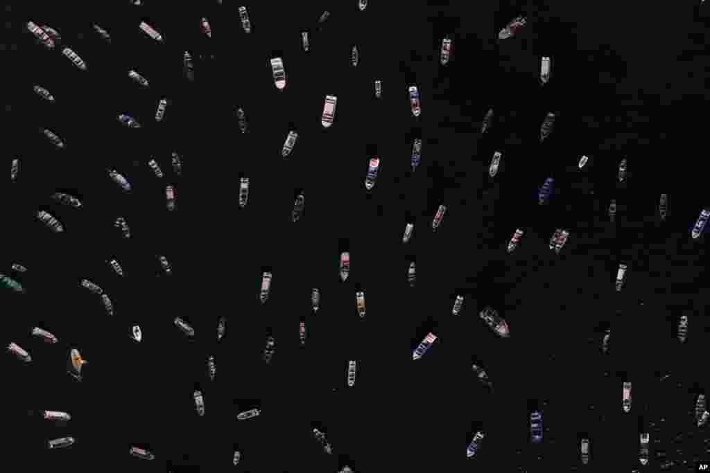 Boats float on the bay in Tongoy, Chile, Jan. 22, 2024.