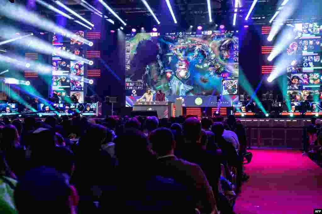 Visitors play the "League of Legends" video-game during the "Paris Games Week" fair in Paris, France, Nov. 1, 2023.