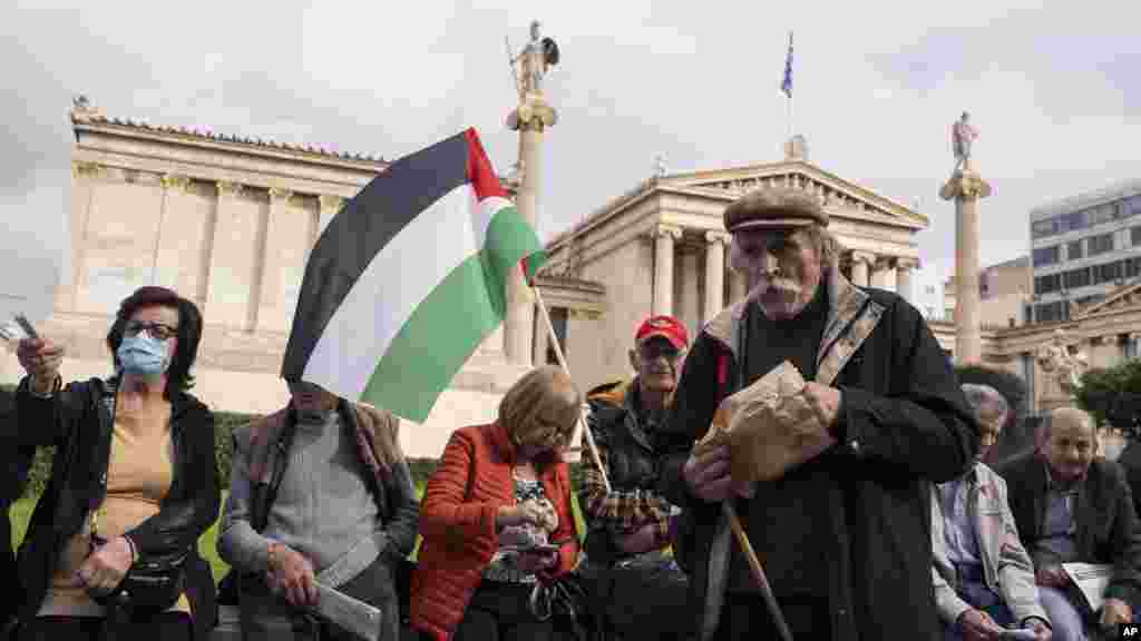 Pensioners gather to protest in front of the Athens Academy in Greece. Pensioners' associations organized the demonstration in response to planned increases they argue are too low to offset high inflation.