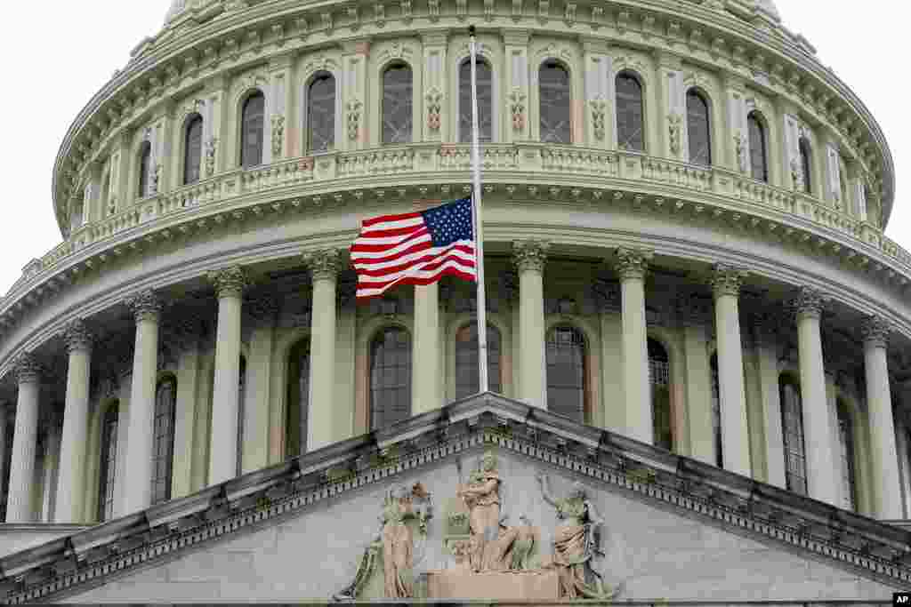 The U.S. flag is seen at half-staff at the Capitol after the death of Sen. Dianne Feinstein, 90, in Washington.