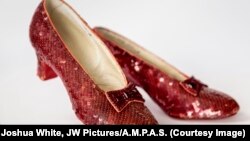 Ruby slippers, designed by Adrian, from The Wizard of Oz (1939), will be among the exhibits at the Academy Museum of Motion Pictures in Hollywood.