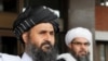Ketua perundingan Taliban Afghanistan Mullah Abdul Ghani Baradar (depan) usai pembicaraan damai dengan para politisi senior Afghanistan di Moskow, Rusia, 30 Mei 2019. (Foto: dok)