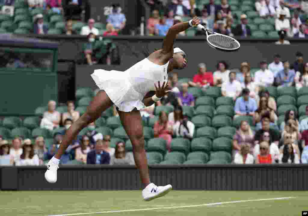 Coco Gauff of the U.S. serves to Russia's Elena Vesnina during the women's singles second round match on day four of the Wimbledon Tennis Championships in London.