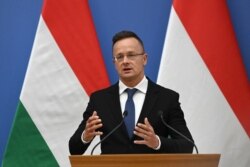 FILE - Hungary’s foreign and trade minister Peter Szijjarto addresses a press conference in Budapest on September 10, 2021,