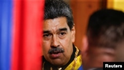 El presidente venezolano Nicolás Maduro llega al acto oficial de inauguración del año judicial en la sede del Tribunal Supremo de Justicia, en Caracas, el 31 de enero de 2024.