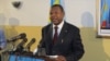 FILE - DRC Communications minister and governement spokesman, Lambert Mende, giving a press conference at his office, in Kinshasa. 