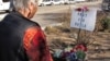Laura Spaeth visits a memorial honoring slain U.S. hostage Kayla Mueller at the courthouse plaza in Prescott, Arizona, Feb. 10, 2015. 