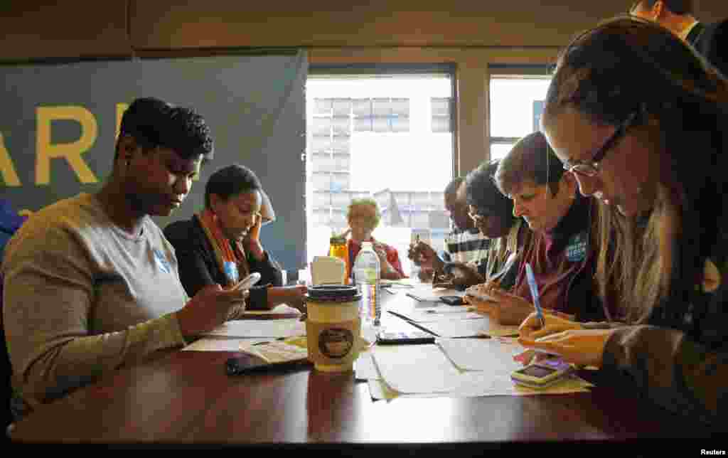 Volunteers for Obama's re-election campaign place phone calls to voters and other volunteers at a field office on the south side of Chicago on election day.