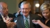 Senate Majority leader Mitch McConnell smiles as he leaves the chamber after announcing the release of the Republicans' healthcare bill which represents the party's long-awaited attempt to scuttle much of President Barack Obama's Affordable Care Act, at the Capitol in Washington, June 22, 2017. 