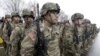 FILE - U.S. troops military troops line up in November 2015. Authorities say two Afghan men getting military training in the United States are missing.