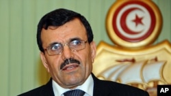 New Prime Minister of Tunisia, Ali Larayedh, delivers a speech during a press conference in Tunis, February 22, 2013.
