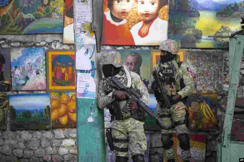 Soldiers patrol in Petion Ville, the neighborhood where the late Haitian President Jovenel Moise lived in Port-au-Prince.