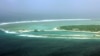FILE - This file aerial view taken on July 27, 2012, shows part of the city of Sansha on the island of Yongxing, also known as Woody island in the disputed Paracel chain, which China now considers part of Hainan province. 
