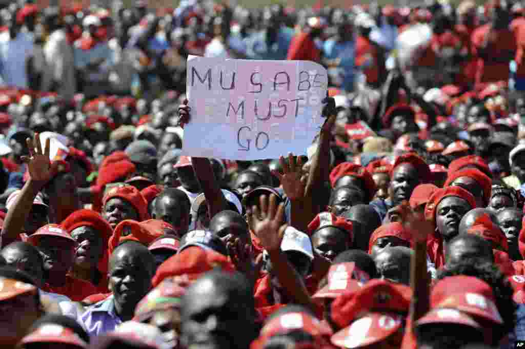 A poster showing opposition to Zimbabwe's President Robert Mugabe is seen at a final Movement For Democratic Change (MDC) campaign rally in Harare, July 29, 2013.