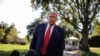 FILE - U.S. President Donald Trump talks to reporters as he departs for campaign travel to Ohio from the South Lawn at the White House in Washington, Sept. 21, 2020.