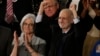 Alan Gross, accompanied by his wife Jusy, acknowledges applause on Capitol Hill in Washington, during Presient Barack Obama's State of the Union address before a joint session of Congress, Jan. 20, 2015.