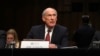 FILE - Director of National Intelligence Dan Coats prepares to testify before the Senate Intelligence Committee, on Capitol Hill in Washington, May 11, 2017. He is said to have been asked by President Donald Trump to disavow possible Russian collusion with his election campaign but refused to confirm such reports.