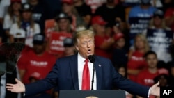 Donald Trump no comício no sábado, 20 de junho